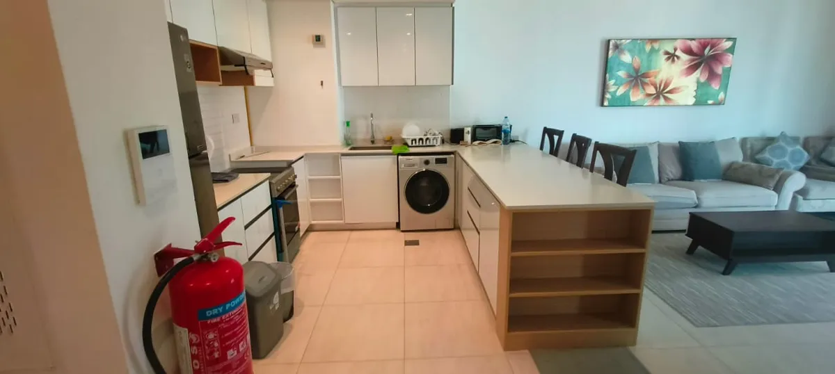 Apartment cleaning — kitchen & living area — after cleaning by Kharolsaab