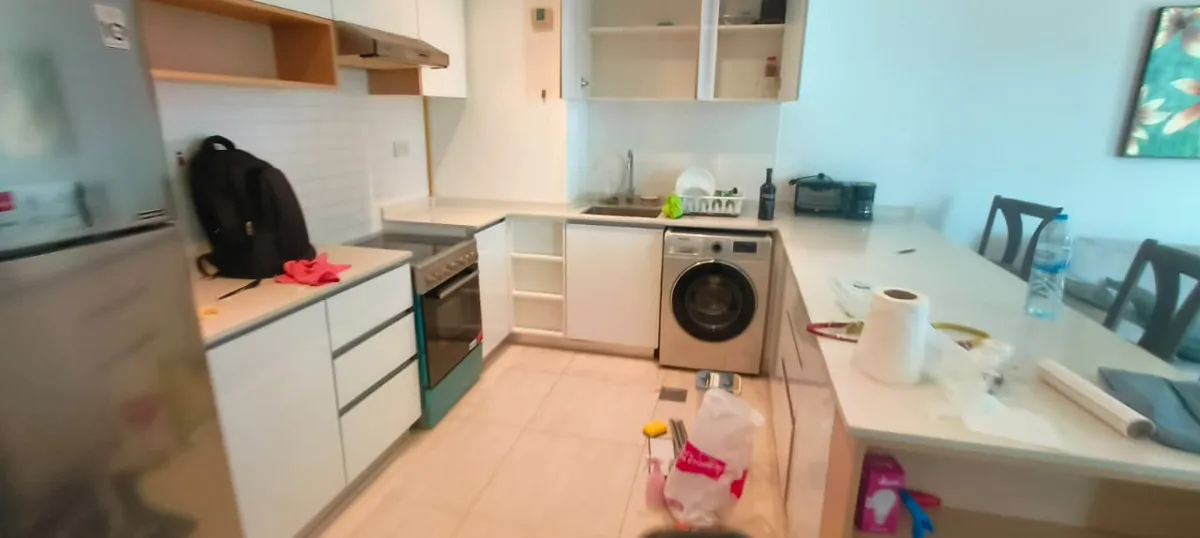 Apartment cleaning — kitchen & living area — before cleaning